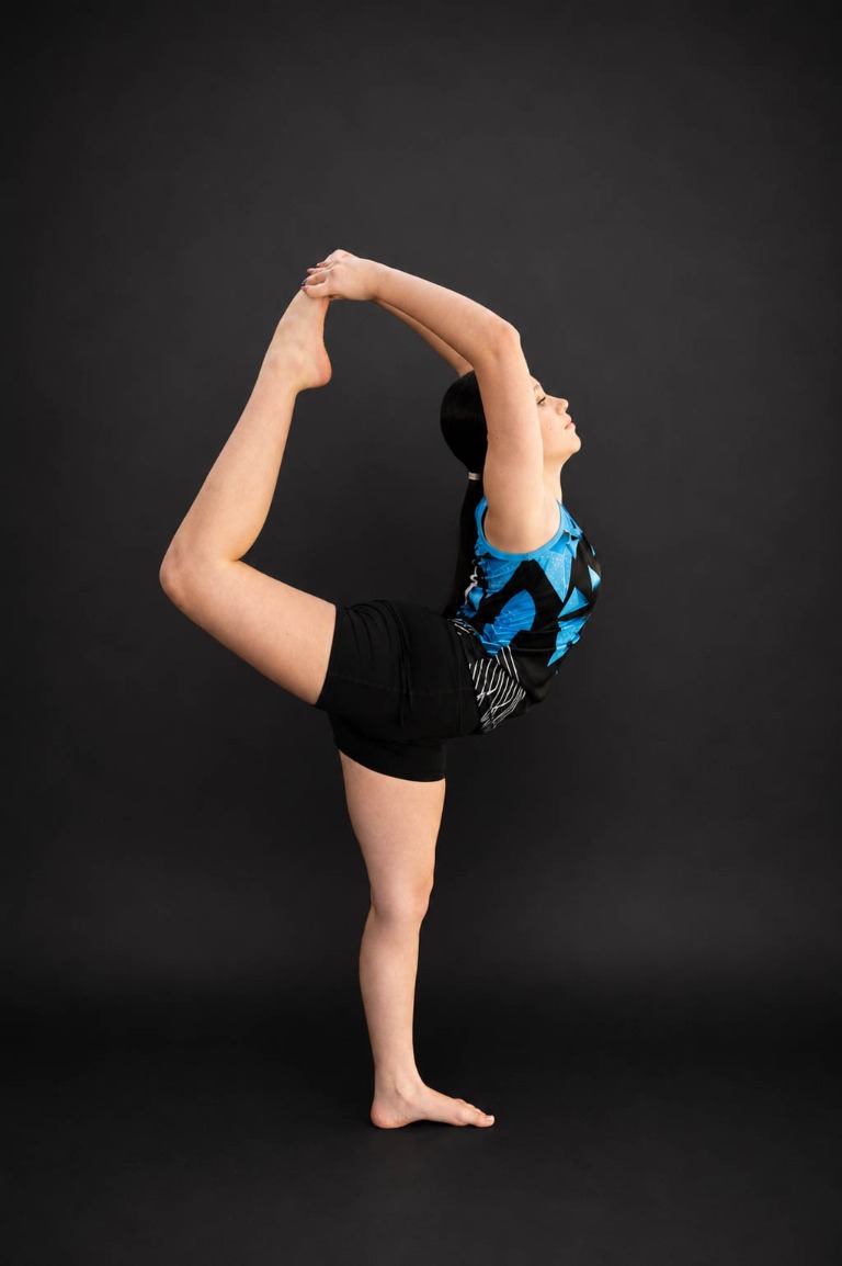 Belong dancer performing a standing flexibility pose